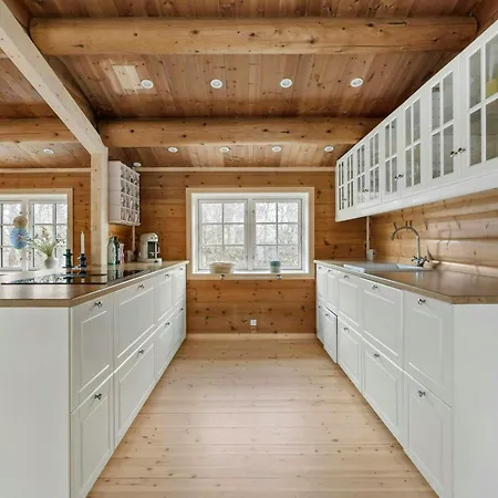 Log House Close To The Sea And Coastal Towns