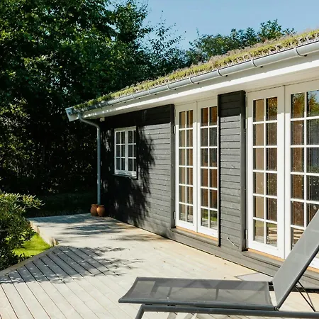 Log House Close To The Sea And Coastal Towns
