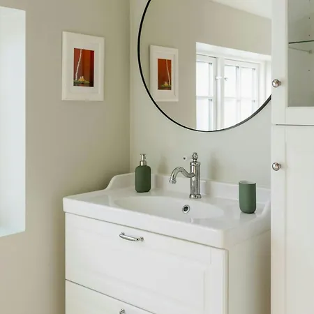 Log House Close To The Sea And Coastal Towns