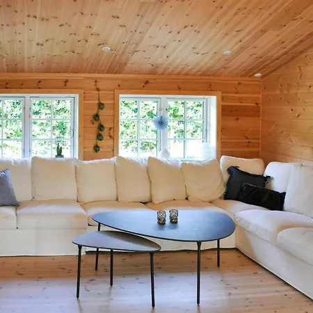 Log House Close To The Sea And Coastal Towns